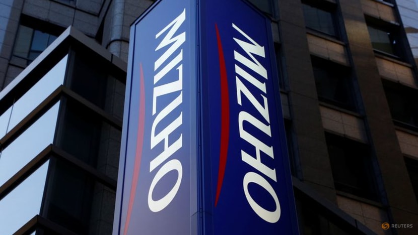 Mizuho, MUFG join race by Japan's banks for money manager deals overseas Mizuho, MUFG join race by Japan's banks for money manager deals overseas