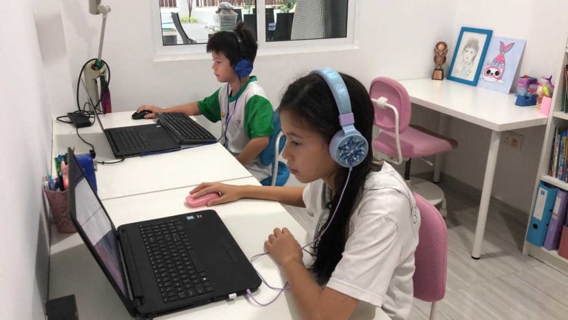Parents hunt for laptops, deal with distracted kids on first day of ongoing home-based learning