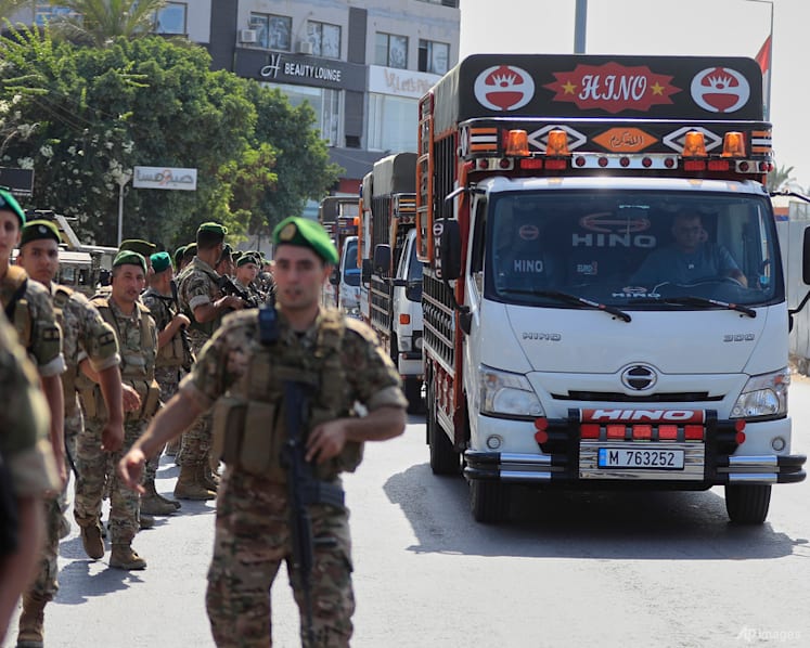 Palestinian factions in Lebanon hand over truckloads of weapons from largest refugee camp