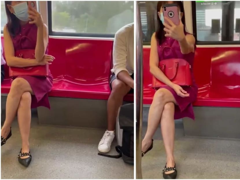A woman in a pink dress is captured in a viral video on social media pointing her phone at other commuters on an MRT train and making racist remarks.