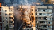 Russia's largest air attack on Ukraine sets fire to main government building