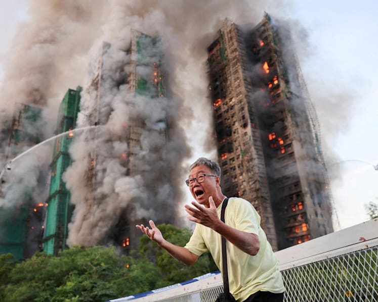 The photo that became a symbol for Hong Kong's deadly fire