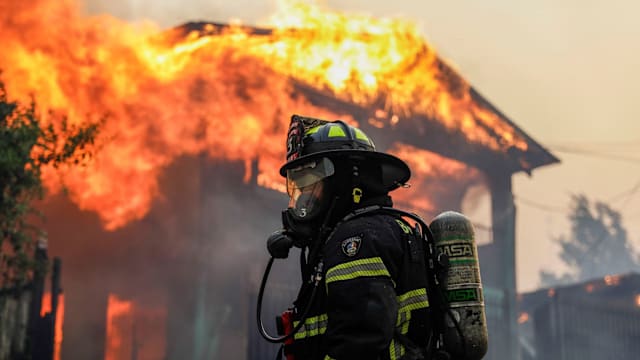 智利多处发生林火 造成18死5万人被迫疏散