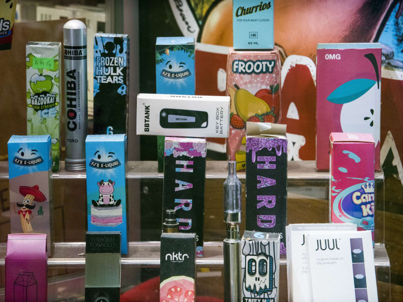 Flavoured e-cigarette products at a store in New York. Mr Amrin said that the e-cigarette industry is increasingly dominated by the tobacco industry. For example, tobacco giant Altria is now a big shareholder of Juul, a major manufacturer of e-cigarettes in the US.