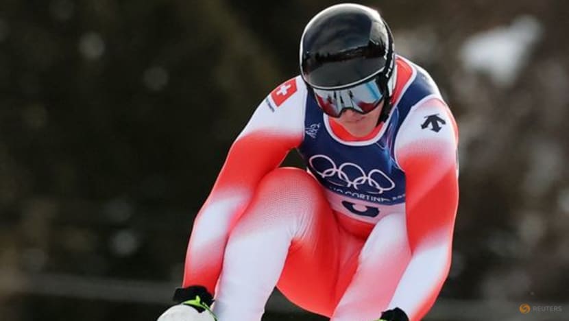 Alpine skiing-Von Allmen strikes gold again with more than a little help from his friend