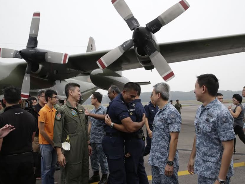 Singapore team deployed to fight forest fires in Indonesia returns