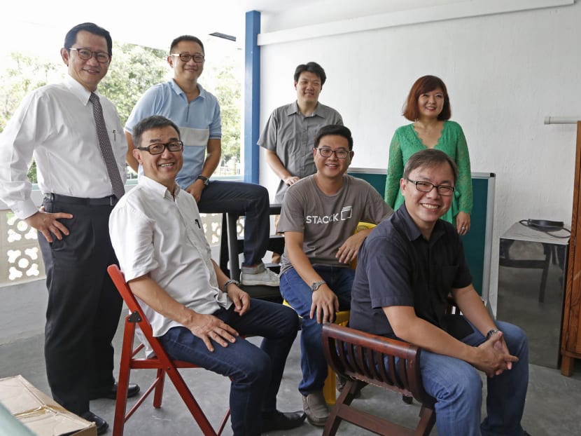 Mr Dean Yap (seated, right) with other founding members of 100 Voices. They aim to share individual stories through various media outlets and in schools. Photo: Raj Nadarajan