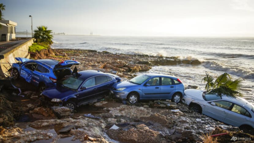 Floods sweep cars into sea, damage homes in northeast Spain