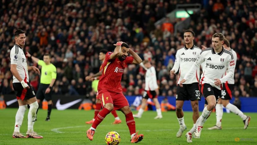 Ten-man Liverpool salvage draw, Arsenal held, Forest go fourth