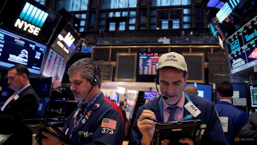 US stocks end higher, Treasury yields rise on easing credit, trade worries