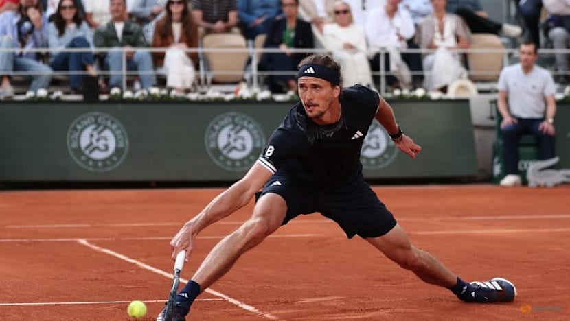 Zverev tears down the wall to enter Grand Slam winners' circle at French Open