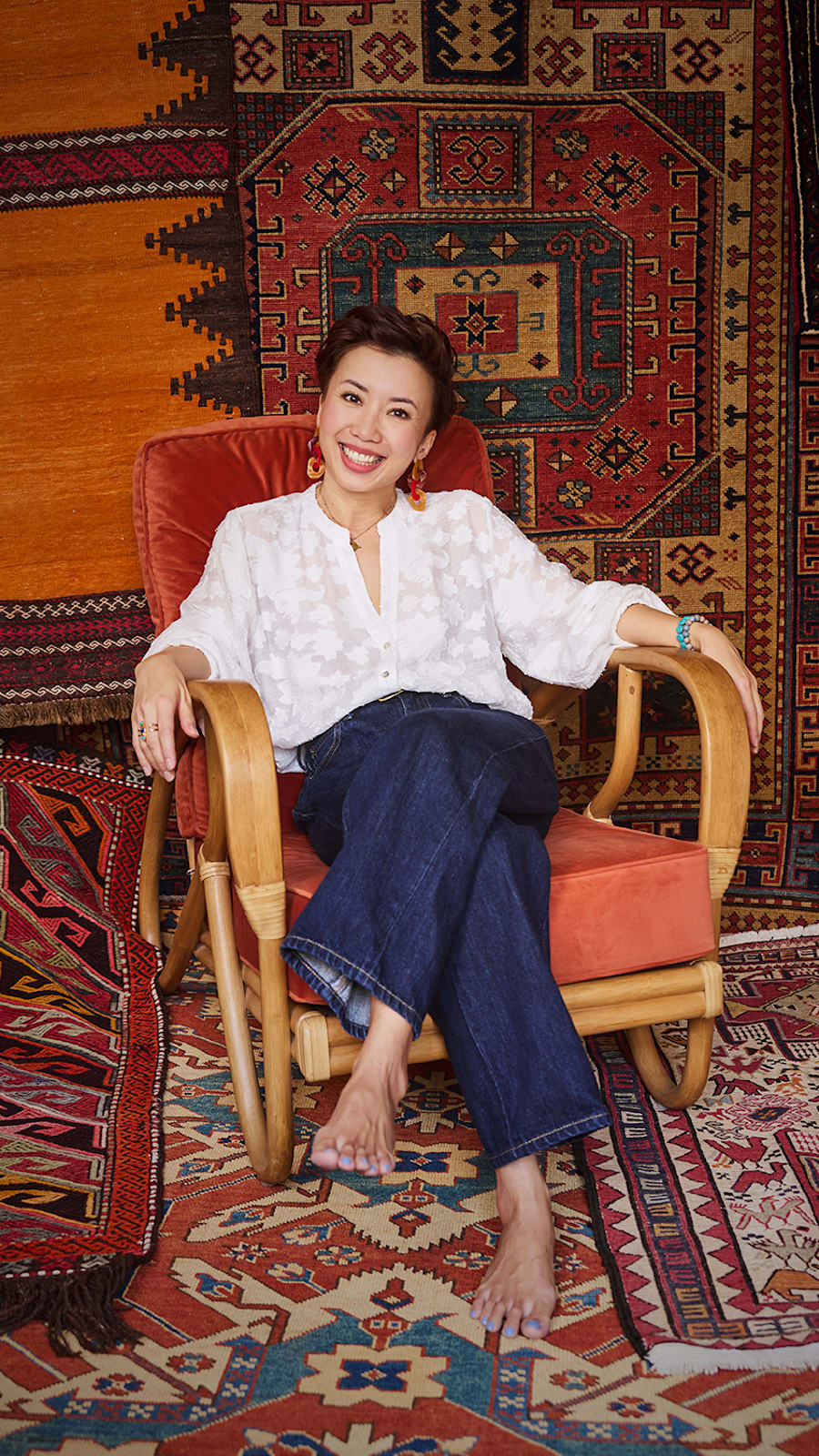 This collector styles her HDB flat with vintage tribal rugs