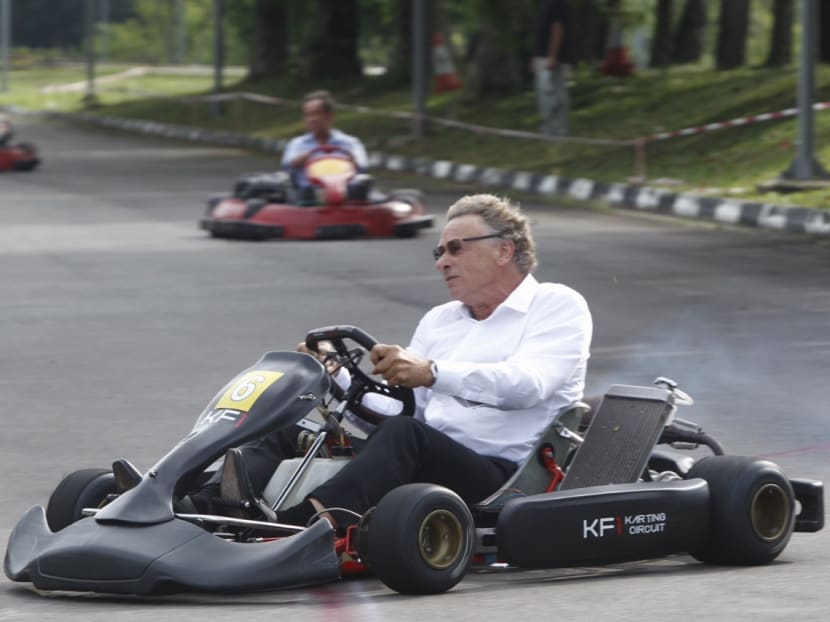 World renowned F1 and KF1 circuit designer Herman Tilke racing laps on the site of the KF1 Karting Circuit at the Singapore Turf Club. Photo: Don Wong