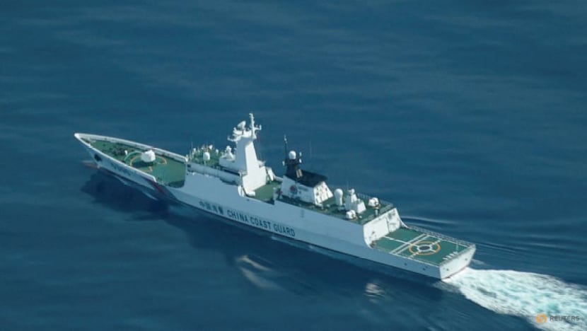 China says it expelled Philippine aircraft, vessels near disputed atolls