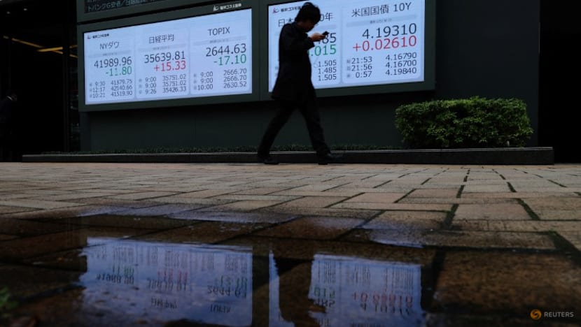 Global bonds tumble as flaring inflation spooks investors