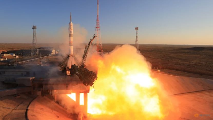 Russia sends American and two cosmonauts to space station with rare NASA chief visit