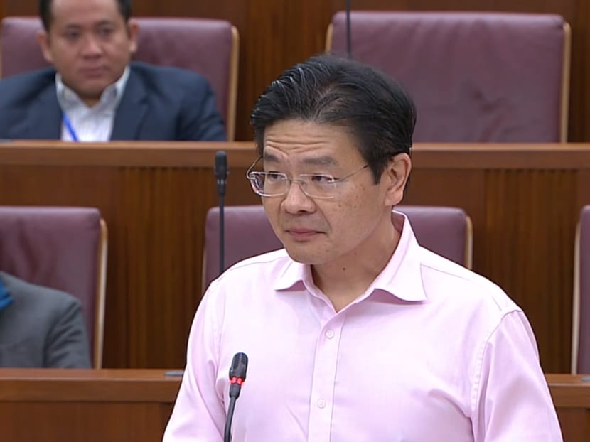 National Development Minister Lawrence Wong speaking in Parliament on March 25, 2020. He became emotional at one point as he described the work of frontline Covid-19 workers.