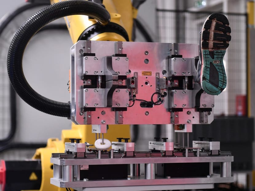 A machine removing an old shoe at Cetia, the very first innovation platform dedicated to the recyclability of textiles and leather articles.