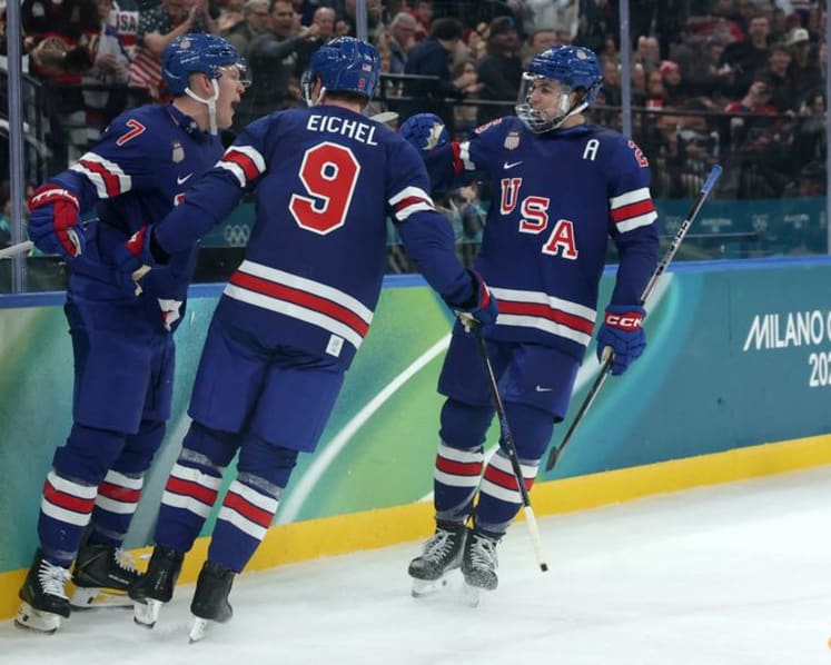 Ice hockey-Slovakia win group, US beat Denmark, Finland, Latvia notch wins