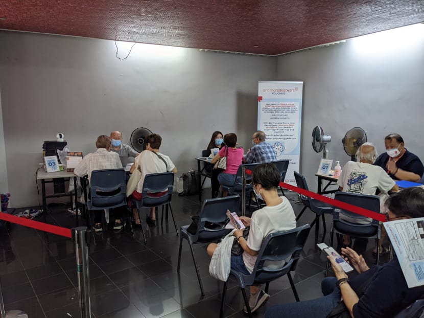 Nearly 30 people were seen waiting to redeem their SingapoRediscovers Vouchers at the Marine Parade Community Club at about 1.30pm on Dec 31, 2021. 