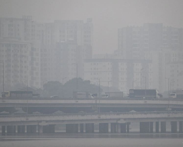 Vietnam urges factories to cut output as Hanoi chokes on smog