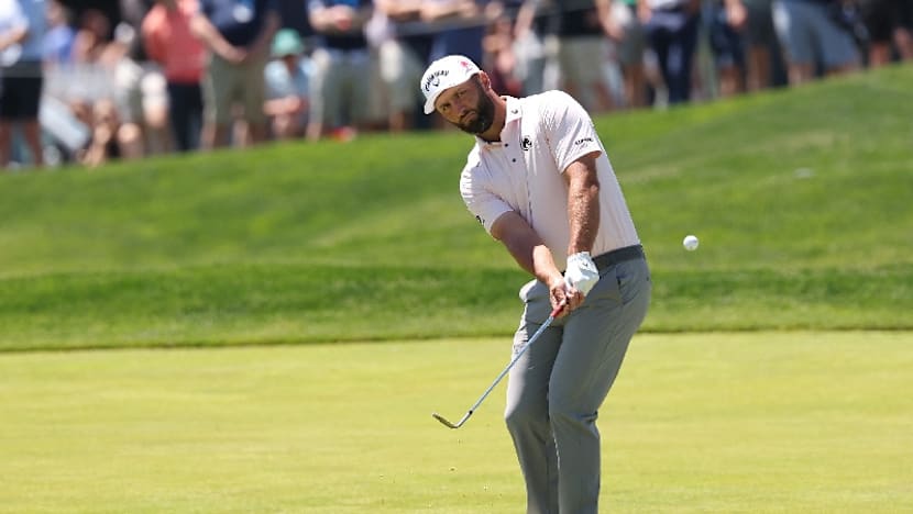 Rahm puts LIV spotlight aside after surging into PGA contention