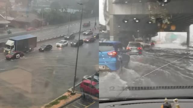吉隆坡暴雨来袭 道路淹水车辆涉水前行