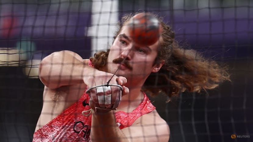 Katzberg retains world hammer title with monster throw