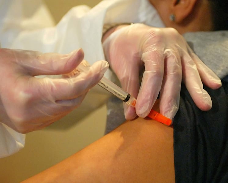Why is Singapore’s adult vaccination rate so low?