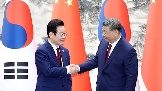 中韩领导人就朝鲜半岛和平交换意见 达成多项共识