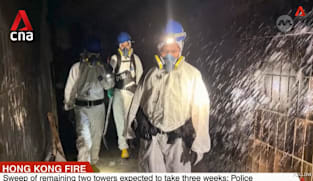Hong Kong fire: Police say a sweep of two remaining towers expected to take three weeks