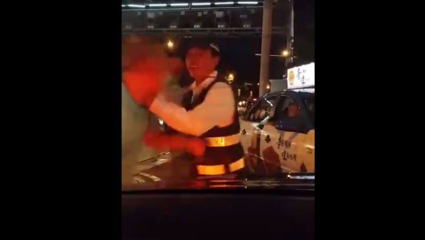 Police arrest suspended LTA officer caught in scuffle with Uber driver
