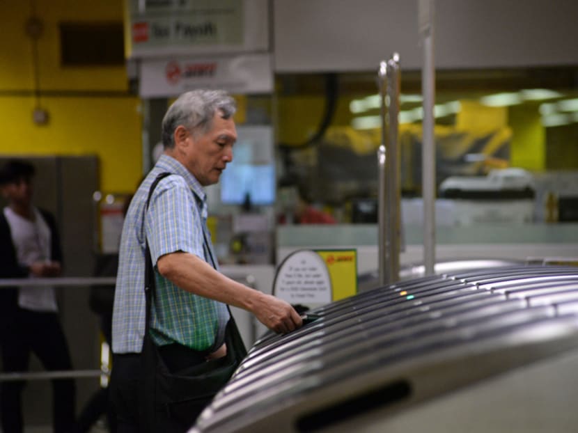 Singapore’s public transport system aims to go cashless by 2020 as part of the Smart Nation push, but some people are at risk of being left behind amid the fast pace of change. TODAY file photo