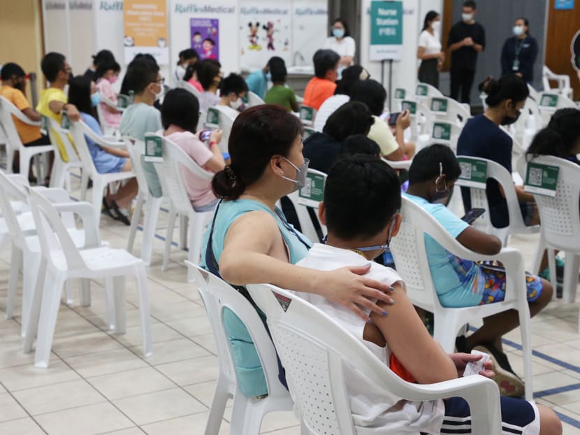 Children being observed after receiving their Pfizer-BioNTech Covid-19 vaccine jab at the Pasir Ris Elias Community Club on Dec 27, 2021. Children being observed after receiving their Pfizer-BioNTech Covid-19 vaccine jab at the Pasir Ris Elias Community Club on Dec 27, 2021.