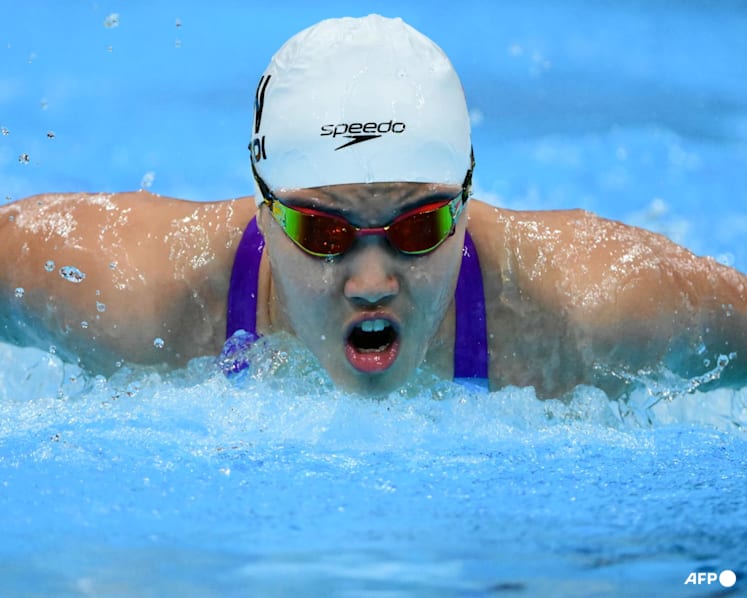 China's 13-year-old Yu cruises as Asian Games swimming begins