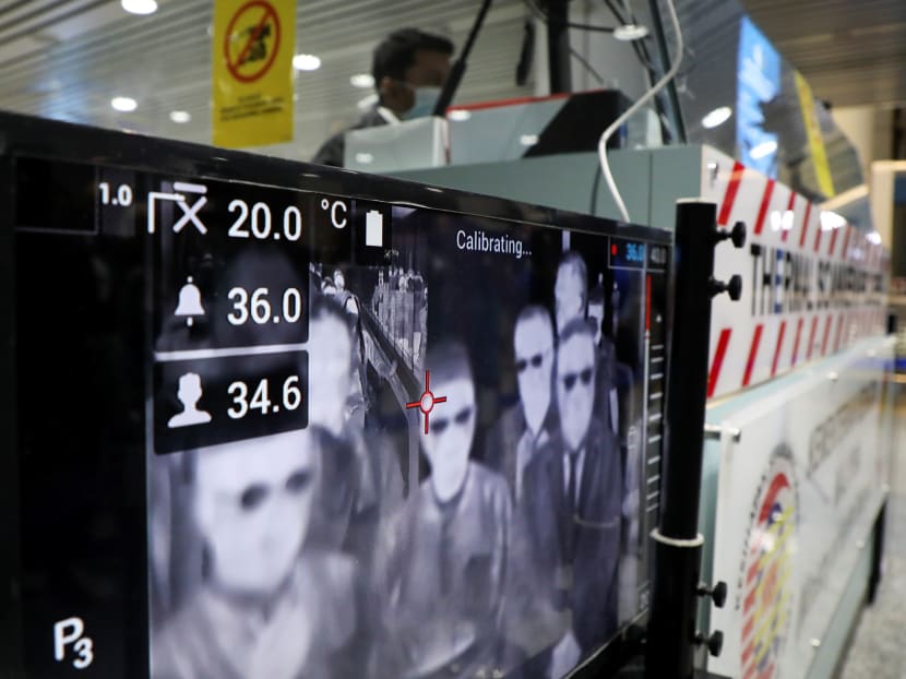 A thermal screening point at Kuala Lumpur International Airport. About 10,000 people from several countries, including Singapore, reportedly attended a mass religious gathering at a mosque located on the outskirts of Kuala Lumpur between Feb 27 and March 1, said Malaysian authorities.