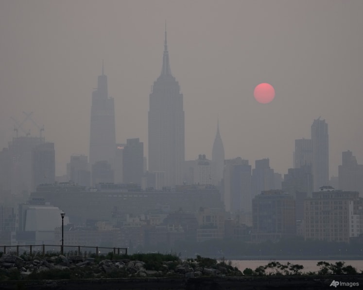 From NYC's skyline to Washington DC's monuments, wildfire haze envelopes familiar sites