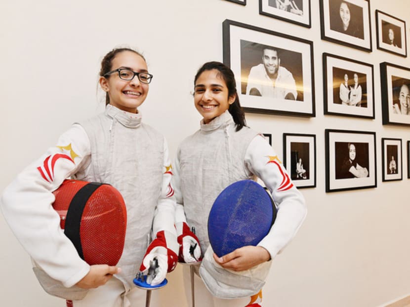 Team Singapore fencing sisters Aarya Berthier (right), 17, and Amita Berthier, 15. After success in Bahrain, they have set their sights on competing in the 2020 or 2024 Olympic Games. Photo: Robin Choo/TODAY