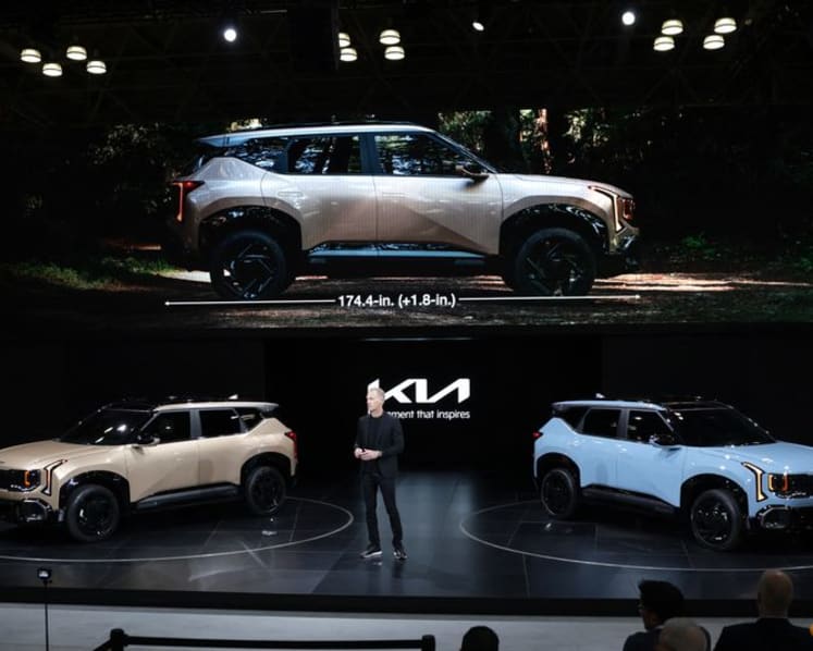 Automakers unveil new EVs for US market despite sales downturn