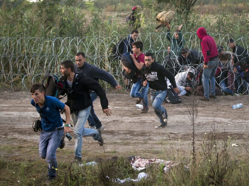 Refugees or migrants? Debate over words to describe crisis