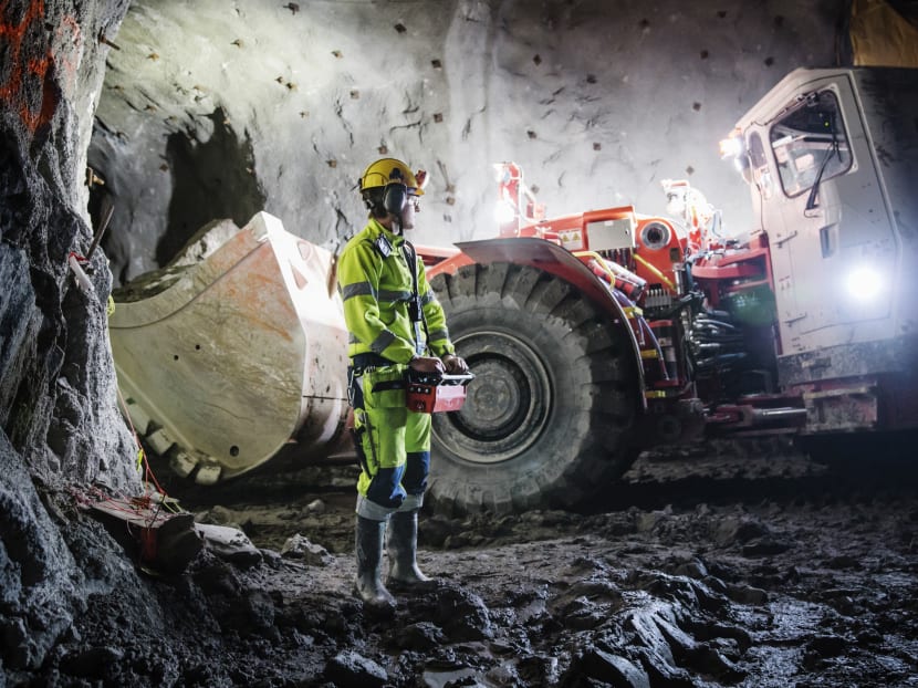 Mr Oskar Pals, 19, operating a loader by remote control at the New Boliden mine in Sweden. In less than 10 years, he says, “this will then be all automated, but I am not worried — there will always be other work tasks.” Photo: THE NEW YORK TIMES