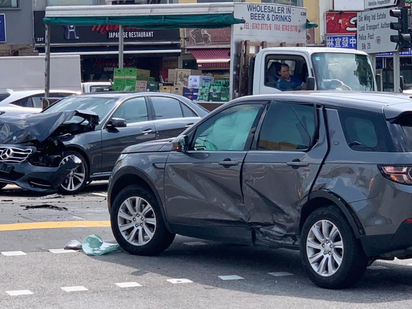 One eyewitness said that people rushed out from the nearby coffee shops to help direct traffic and push a flipped over Range Rover the right side up.