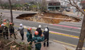 Motorcyclist found dead in Seoul after plunging into giant sinkhole