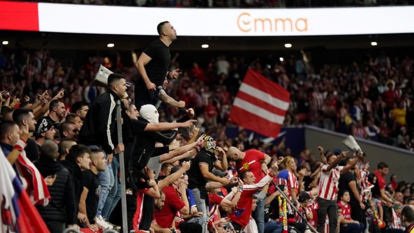Atletico ban spectator who threw object during interrupted Madrid derby Atletico ban spectator who threw object during interrupted Madrid derby