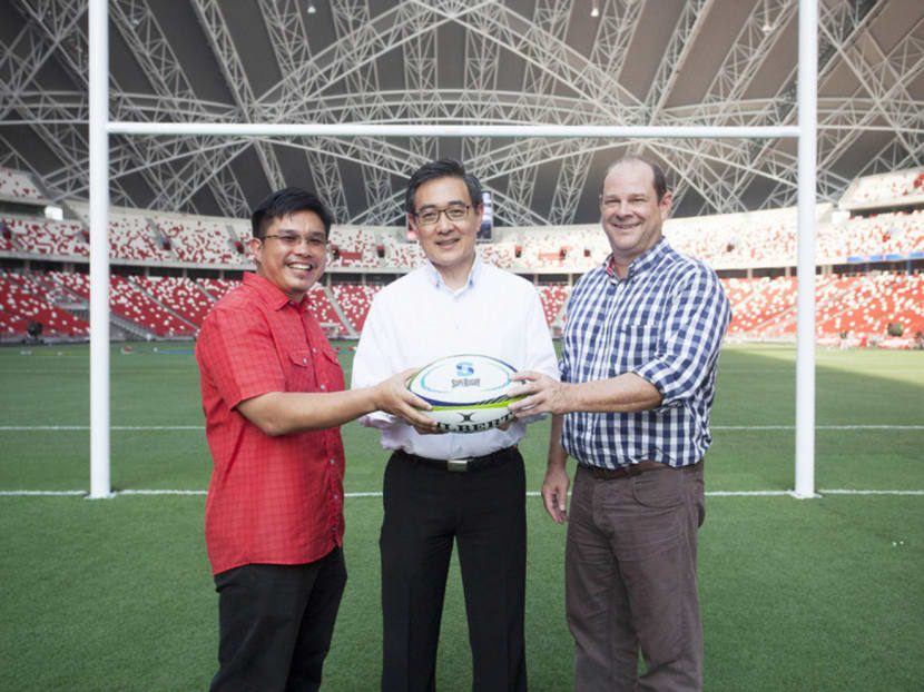 From left to right: Clarence Lam, Singapore Legends team member; Oon Jin Teik, COO, Singapore Sports Hub; and Brendan Morris, operations manager, SANZAR, at the Singapore Sports Hub. Photo: Singapore Sports Hub
