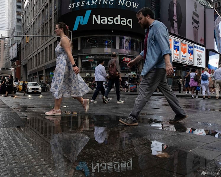 Nasdaq slides to near one-month low as AI rout deepens
