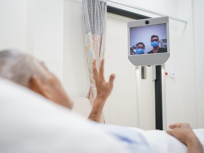 Alexandra Hospital says the robot, know as BeamPro, allows patients to be inspected remotely while being isolated.