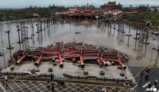 China hit by floods, landslides and heat as extreme weather takes its toll