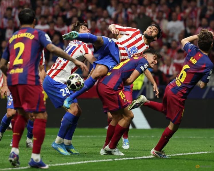 Atletico survive Barca scare to reach first Champions League semi in nine years