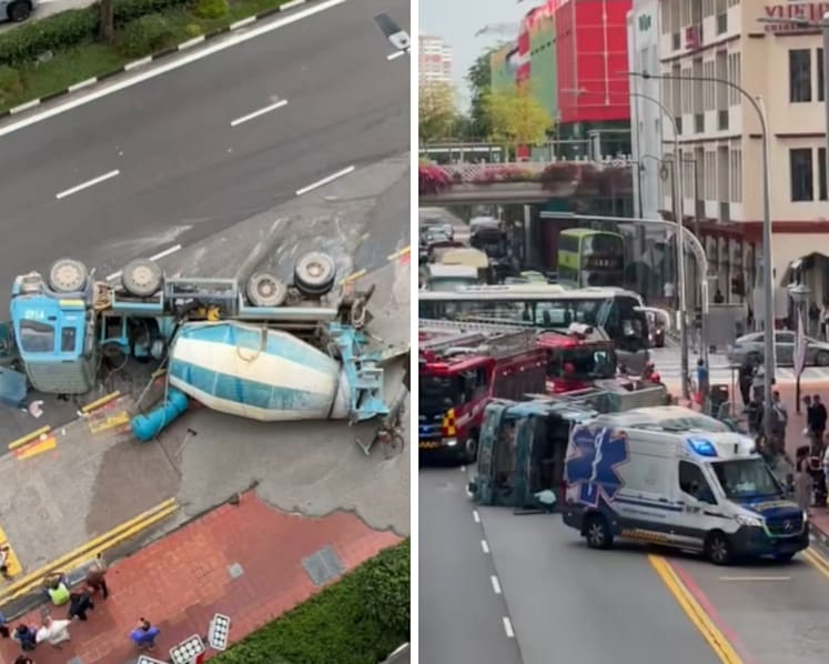 Cement truck overturns in Chinatown; driver taken to hospital